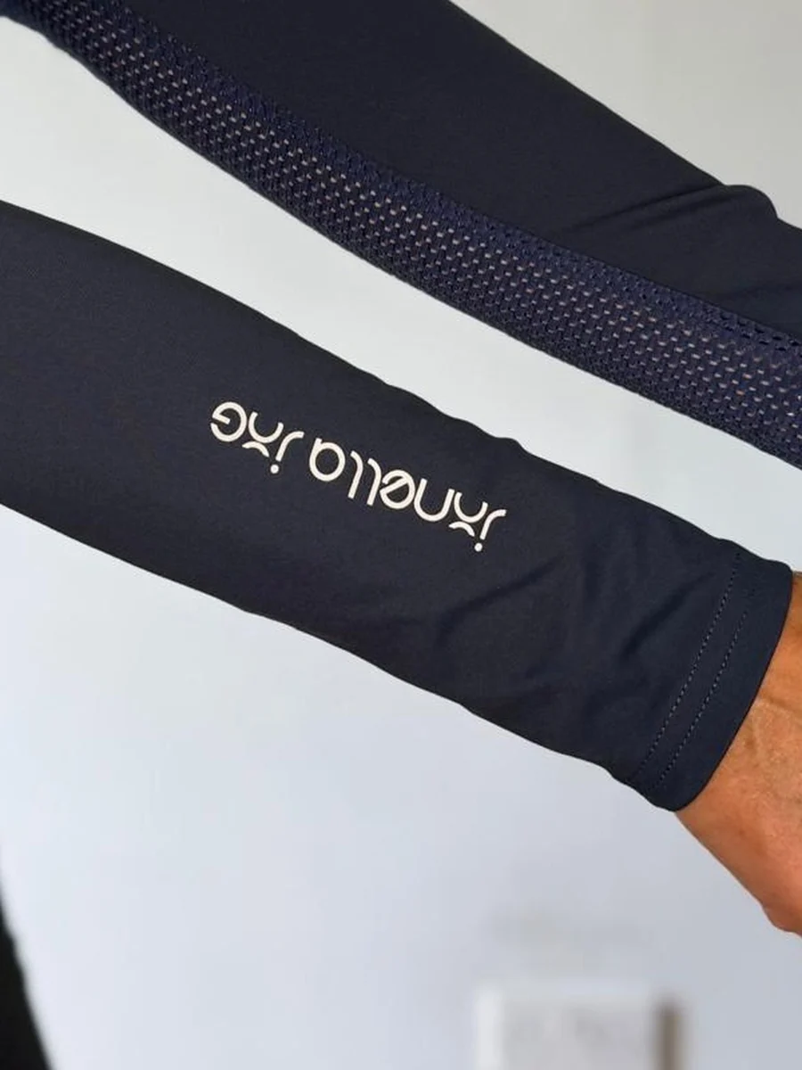 Aero Run Tempo Top in Navy, Jonella Jog logo on the sleeve