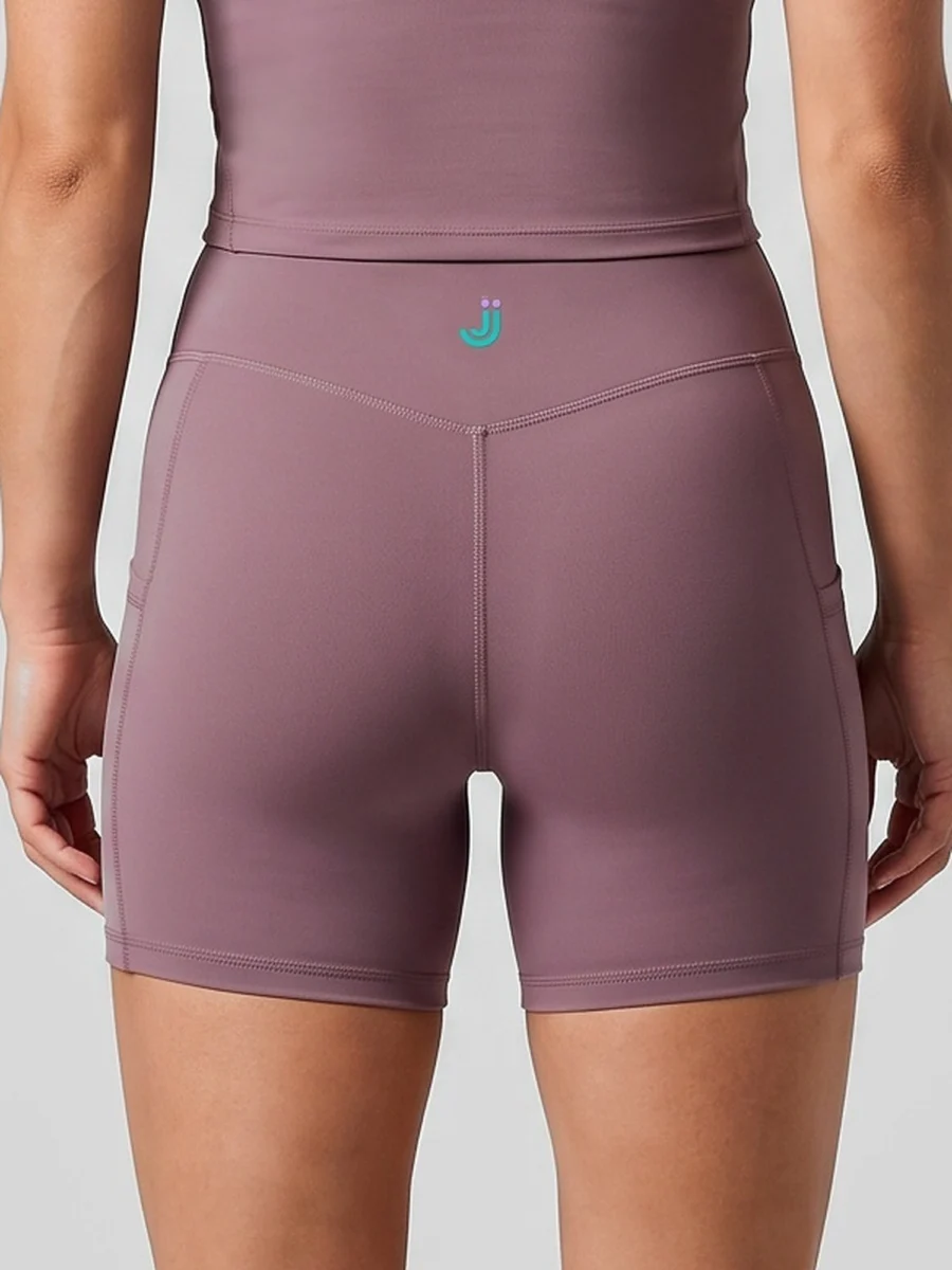 Cycling Shorts with Pockets - Pink/Purple, waistband logo close-up